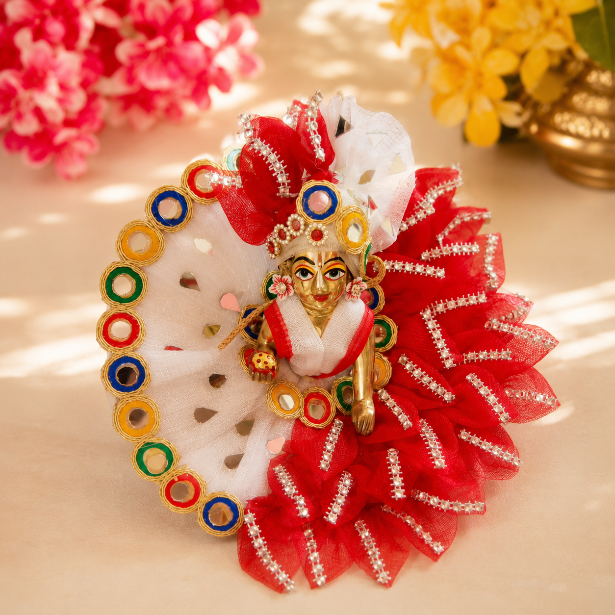 Laddu Gopal idol wearing a handmade teal and gold poshak with premium embroidery